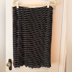 Polka dot, soft pleated, lined skirt by English Laundry. Size Medium